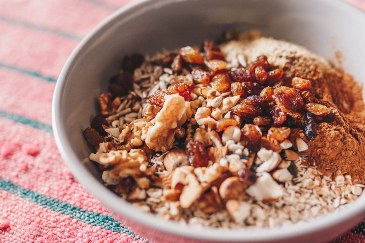 Mastering the First Impression: Your intriguing post title goes here A nutritious oatmeal bowl topped with walnuts, sunflower seeds, and raisins.